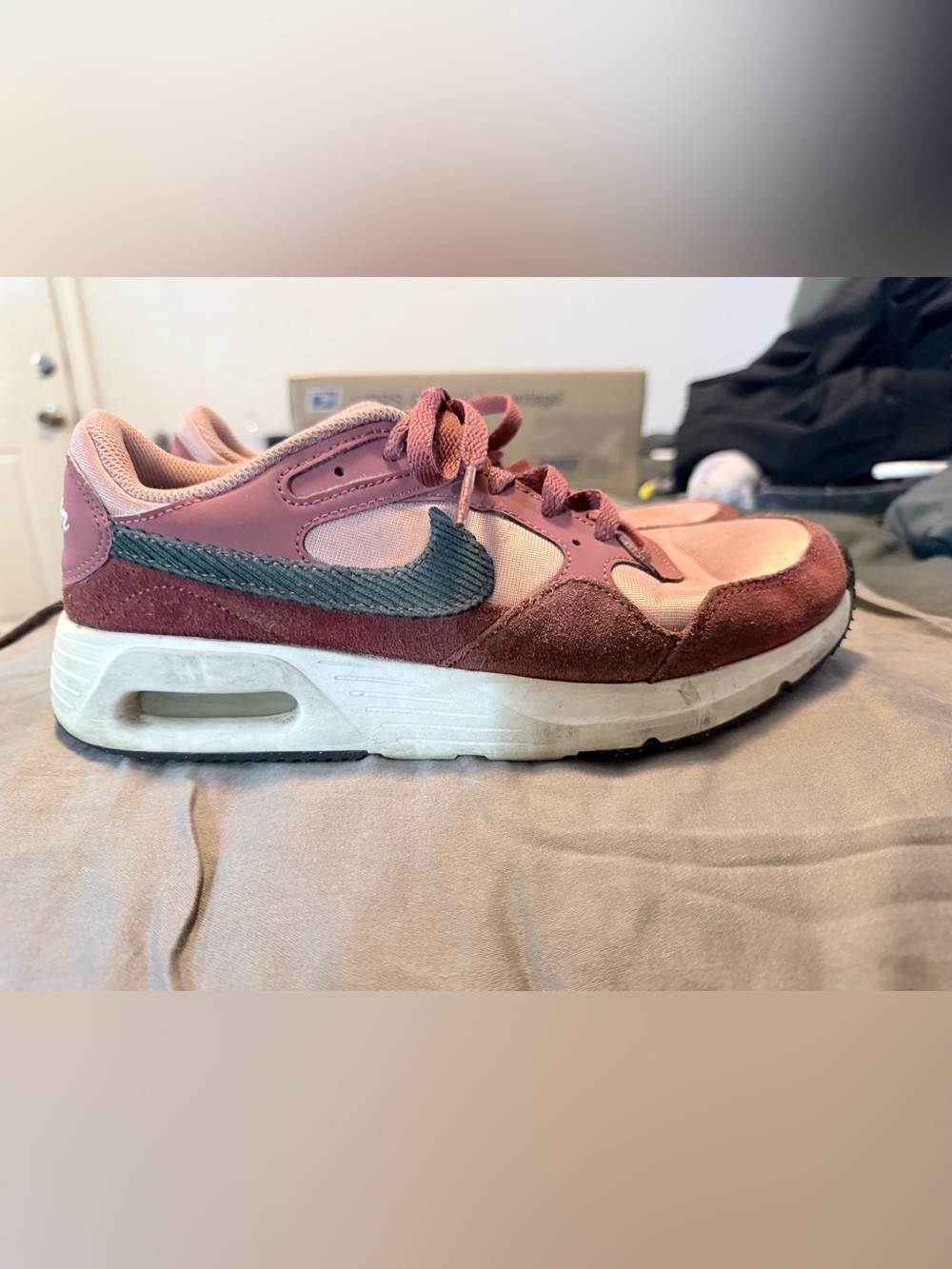 Nike Air in a burgundy , pink with blue Nike check